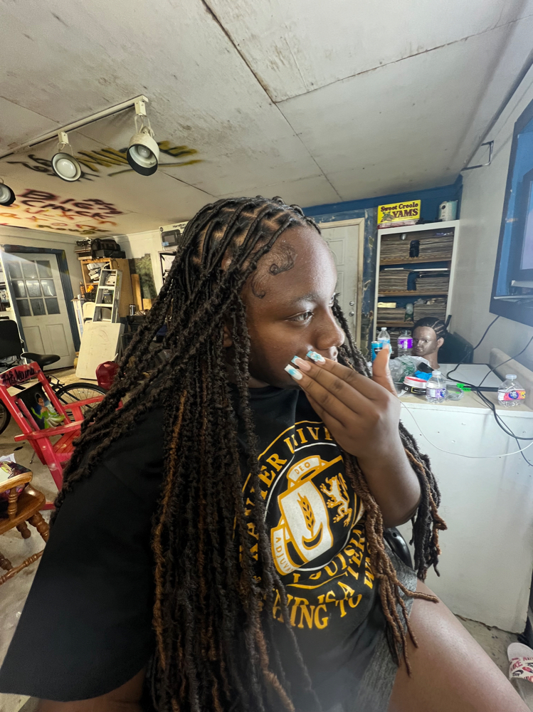 Distressed Locs (Medium) at ManiiStylez in Baton Rouge, LA