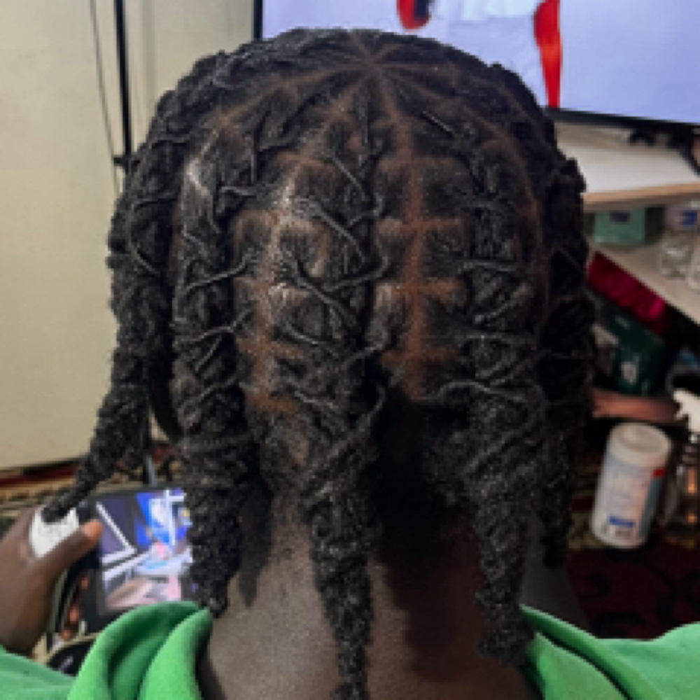 Traditinal Loc Retwist at Cheveux Luxee in Columbia, MD