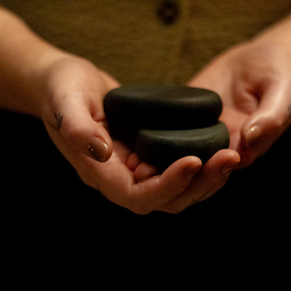 Full Body Hot Stone Massage at Springfield Massage Collective in Springfield, MO