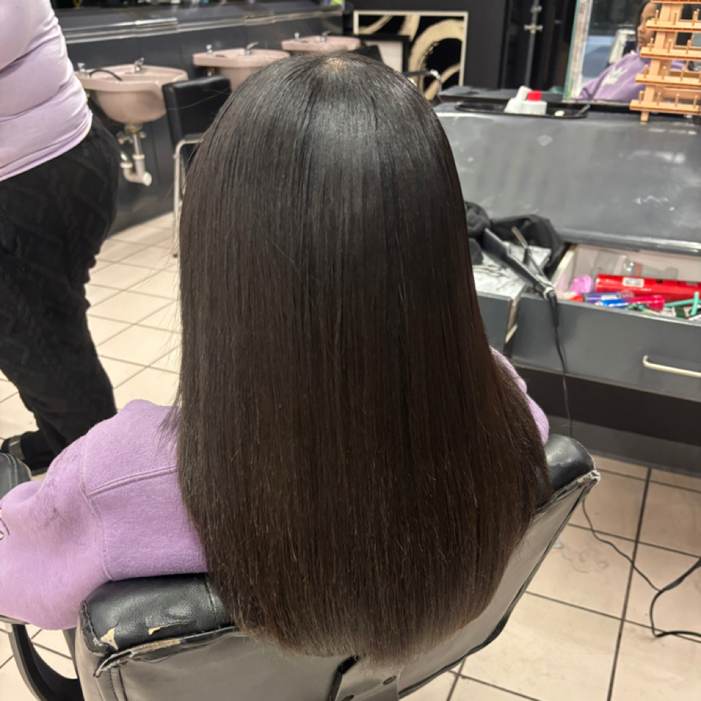Silk Press at StyledByDejaNajee in Bourbonnais, IL