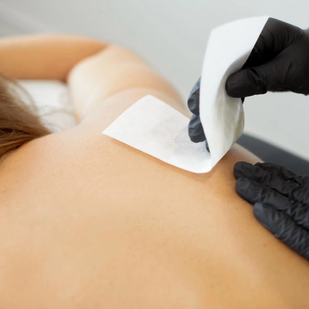 BACK WAX (Half) at Kai_Esthetics in Brookfield, CT