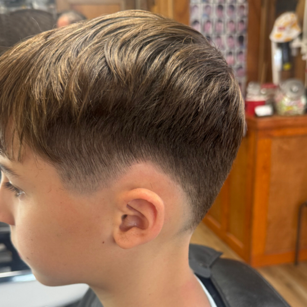 Burst Fade With Textured Fringe at Ruffini’s Barbershop in West Grove, PA