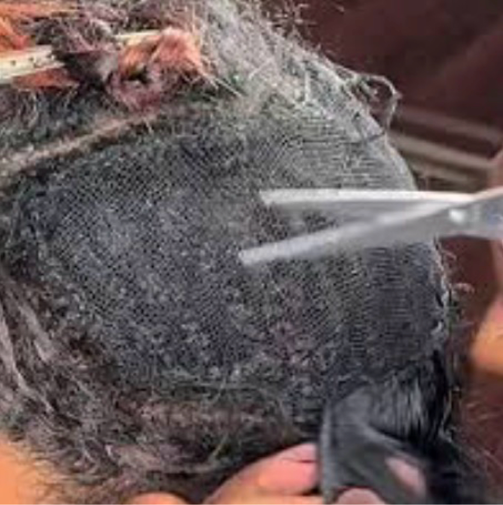 Take out hair from previous style at Ta’Meca Corner At STUDIO 2904 in Goldsboro, NC