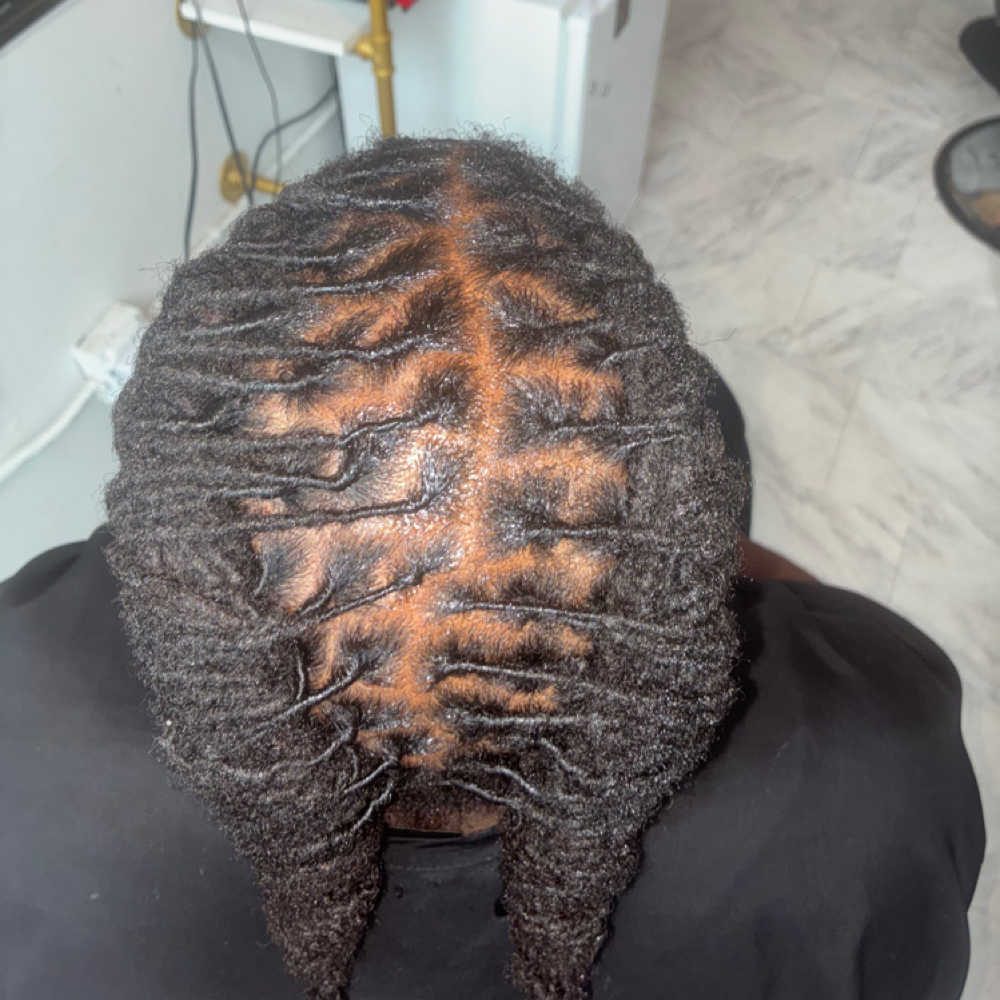 STYLES AFTER ANY LOC RETWIST at AfroDeziac in St. Louis, MO