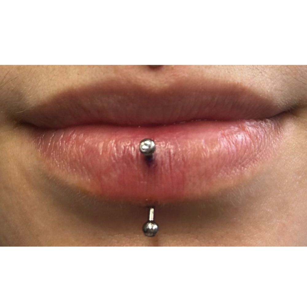 Vertical labret at Wildflower Piercing Company in Alturas, CA