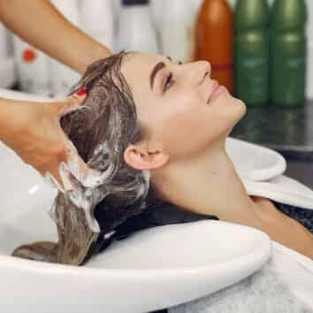 Shampoo and Blow Dry at Iron & Ivy Salon in Baytown, TX