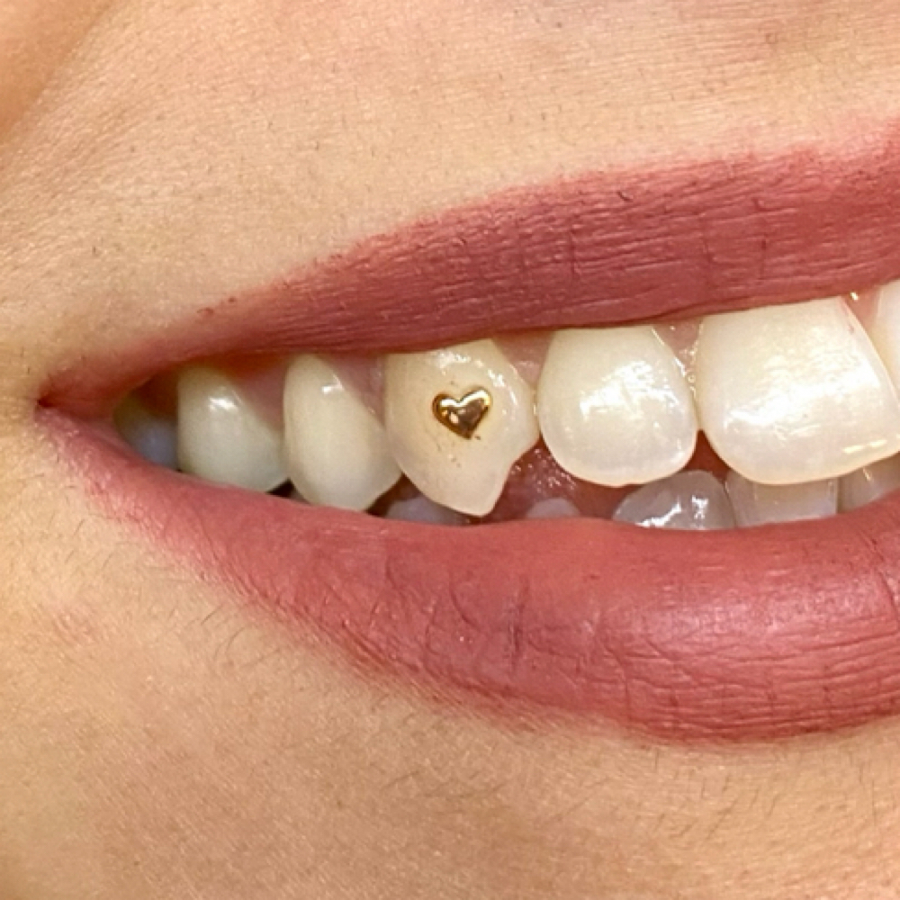 tooth gem (14k gold) at Lillian Claire Lash & Brow in Portland, ME