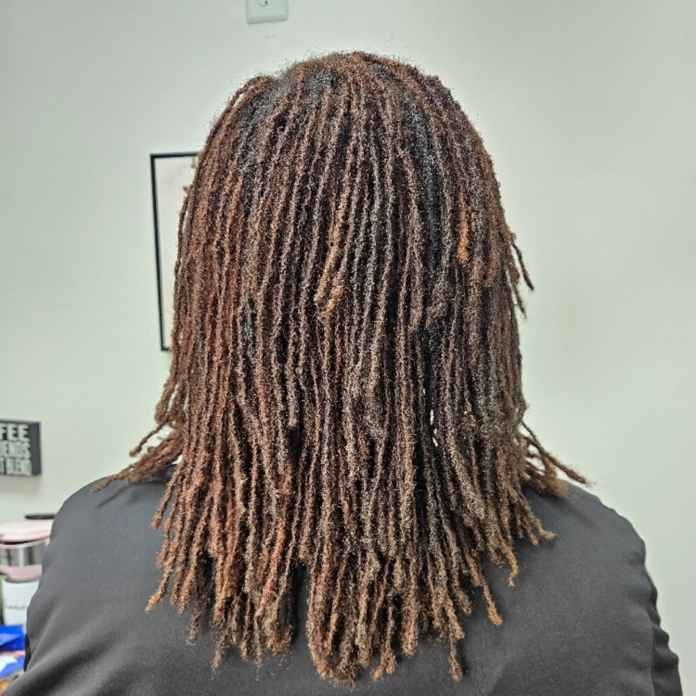Loc Root Strengthening Treatment at CLASSY CEES Crown Ritual in Baton Rouge, LA