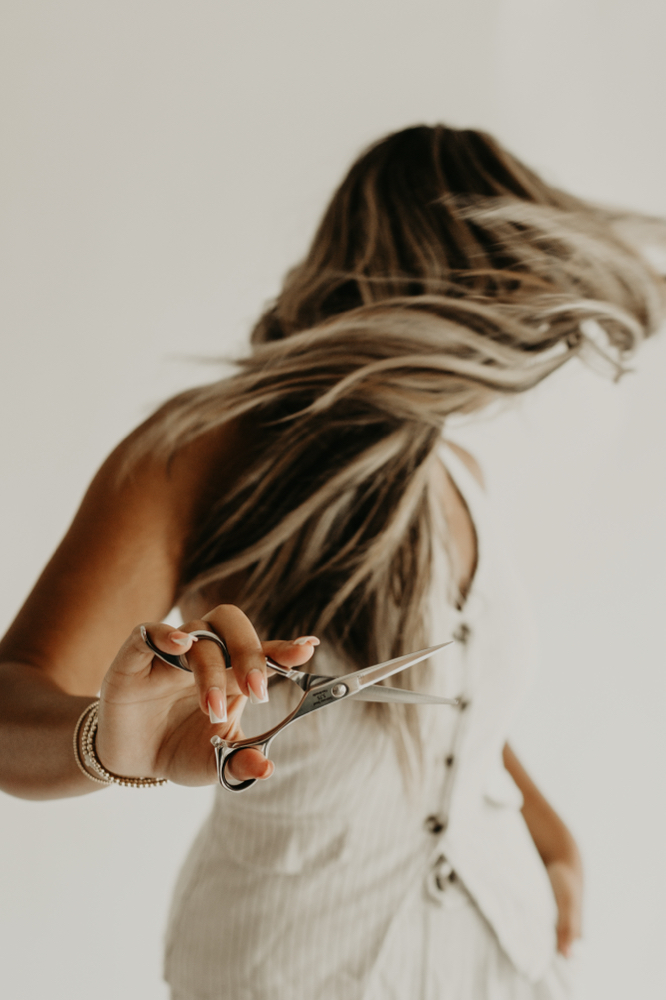 Shampoo Cut & Style at Kanya Roman in Greenville, NC