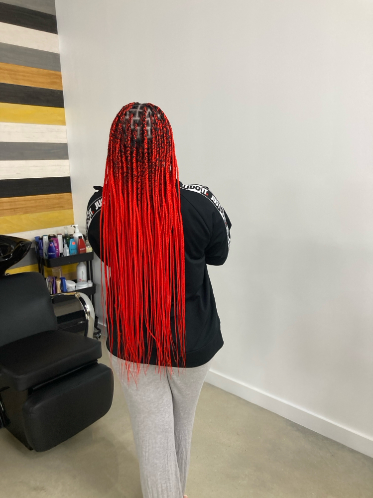 Smedium Knotless Box Braids at BluDiamond Braids in Fort Pierce, FL