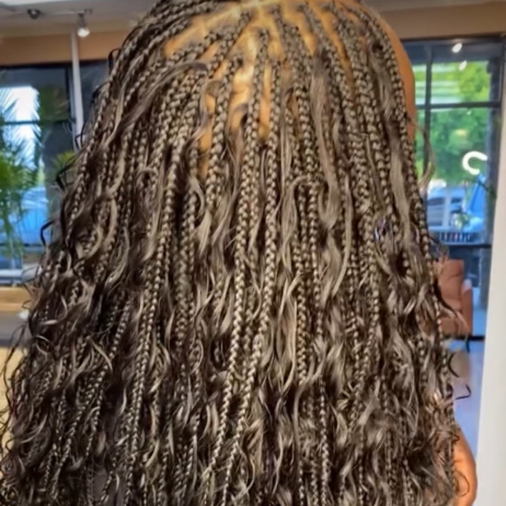 Small knotless braids at The collective salon and barber spa inc in Locust Grove, GA