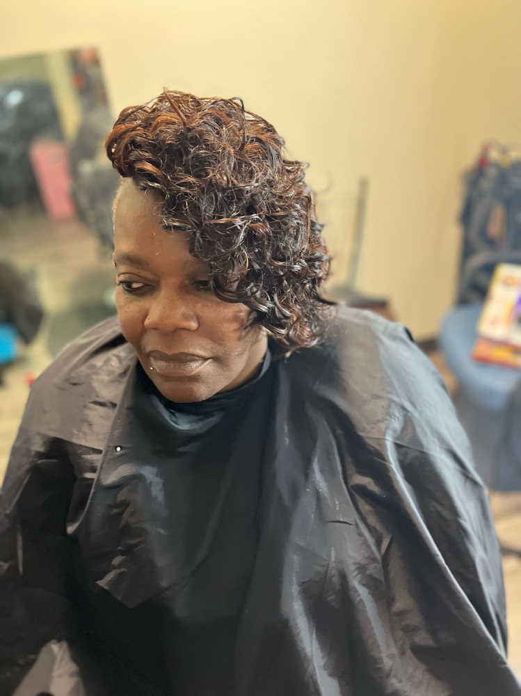 Half Sew In With Braids at BraidsByChardonnay in Milwaukee, WI