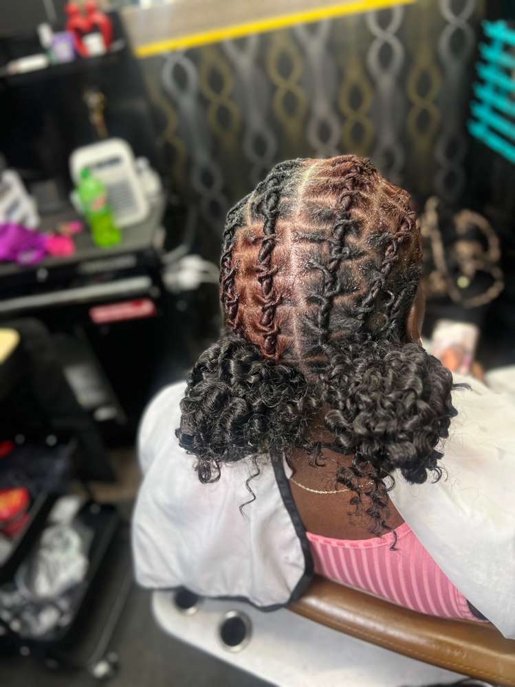Criss Cross Barrels W/Curly Buns at The Loc Junkie LLC in Covington, GA