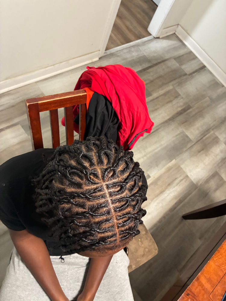 Natural invisible locs at BraidsByJinece in Wichita, KS
