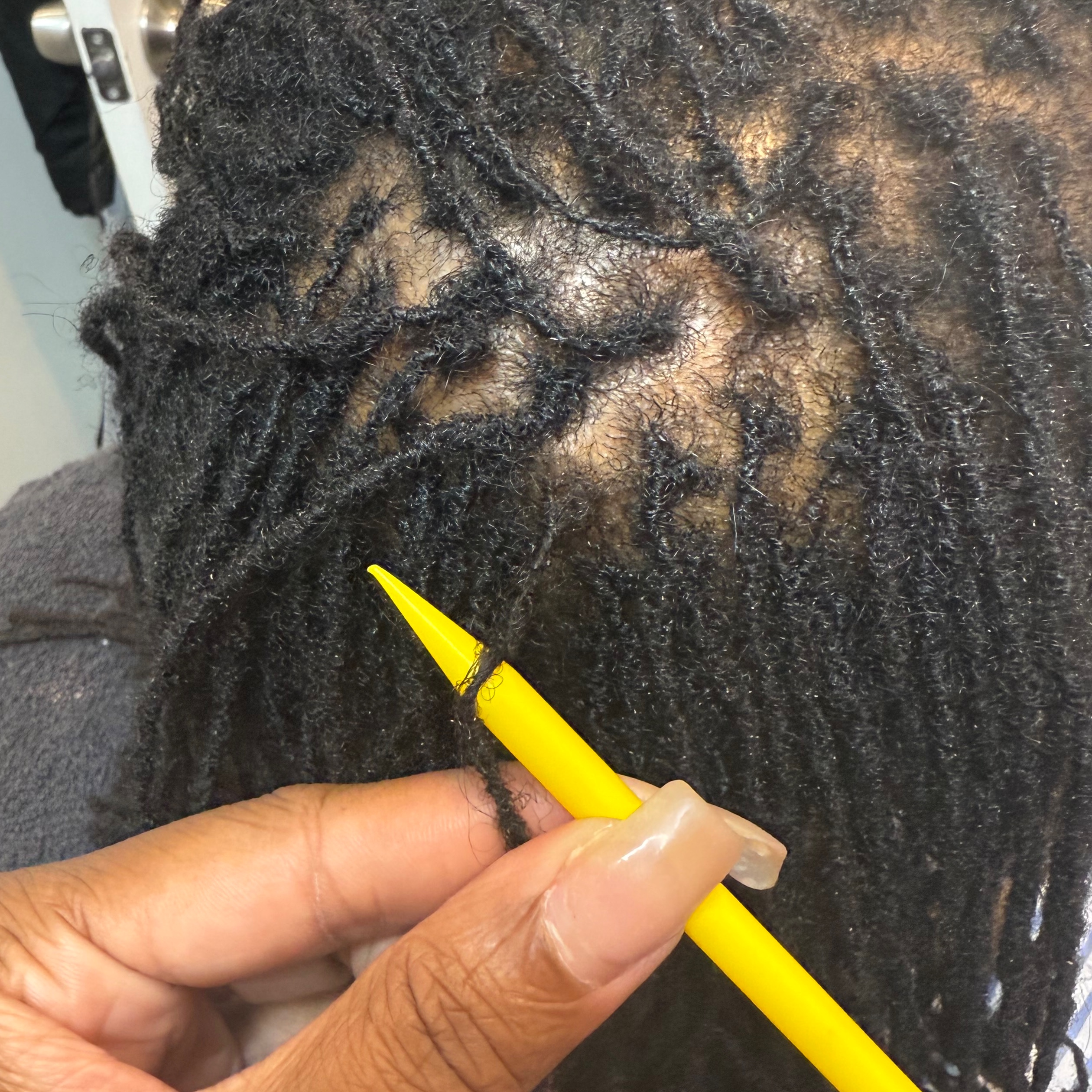 Sisterlock Reconstruction at Mere C Tresses in Chicago, IL