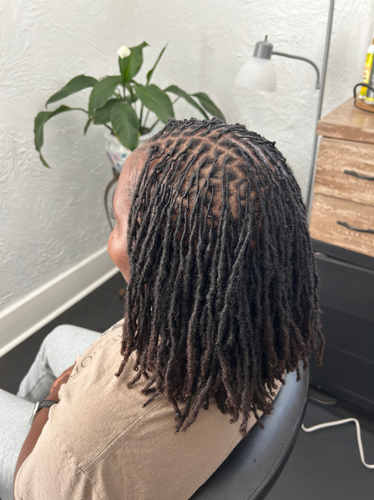 Microlocs Starts At $1,200-$3,000 at 473 Locs Natural hair Studio in Evansville, IN