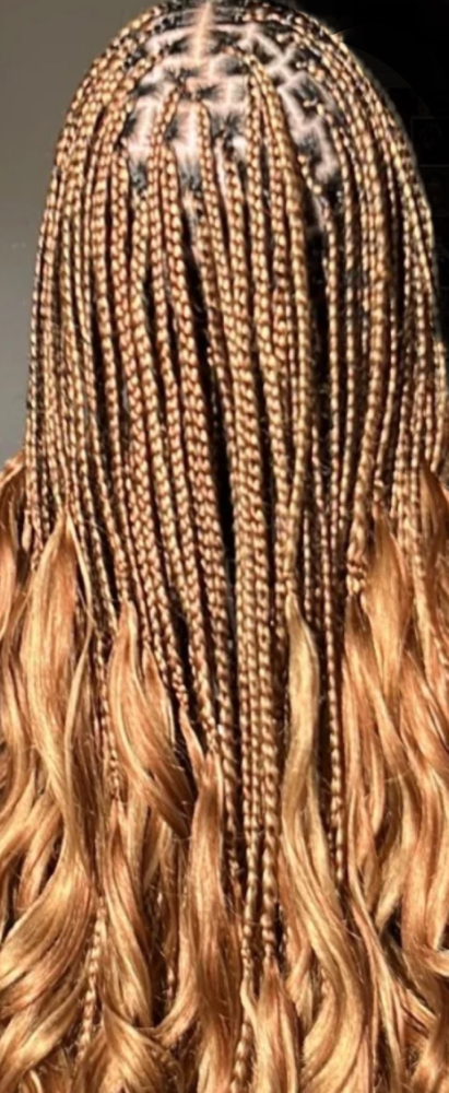 French Curl Knotless Braids at Loc’d -N in Fountain, CO