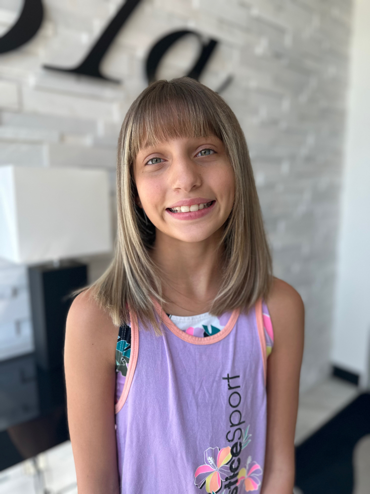 Bang Trim at TMI at The Hair Company in Lansing, MI