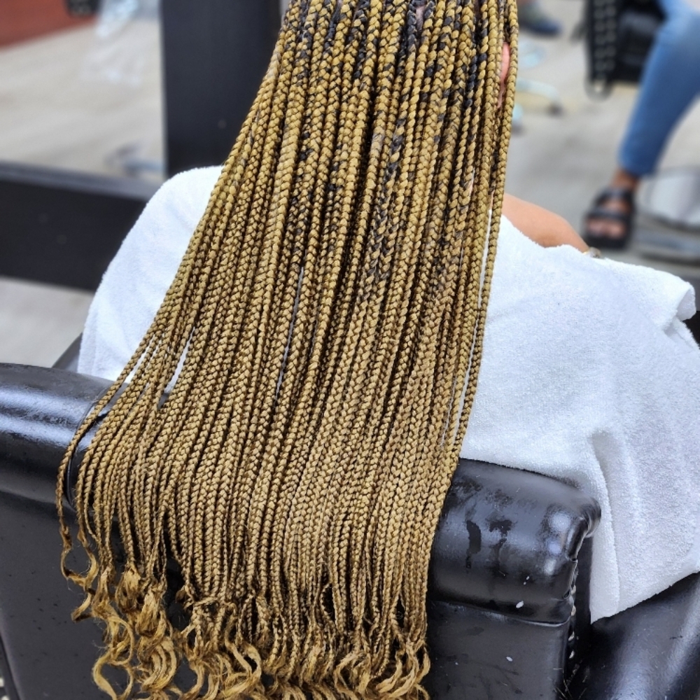Smedium Curly Ends at MaryamuAfricanbraids in Newark, NJ