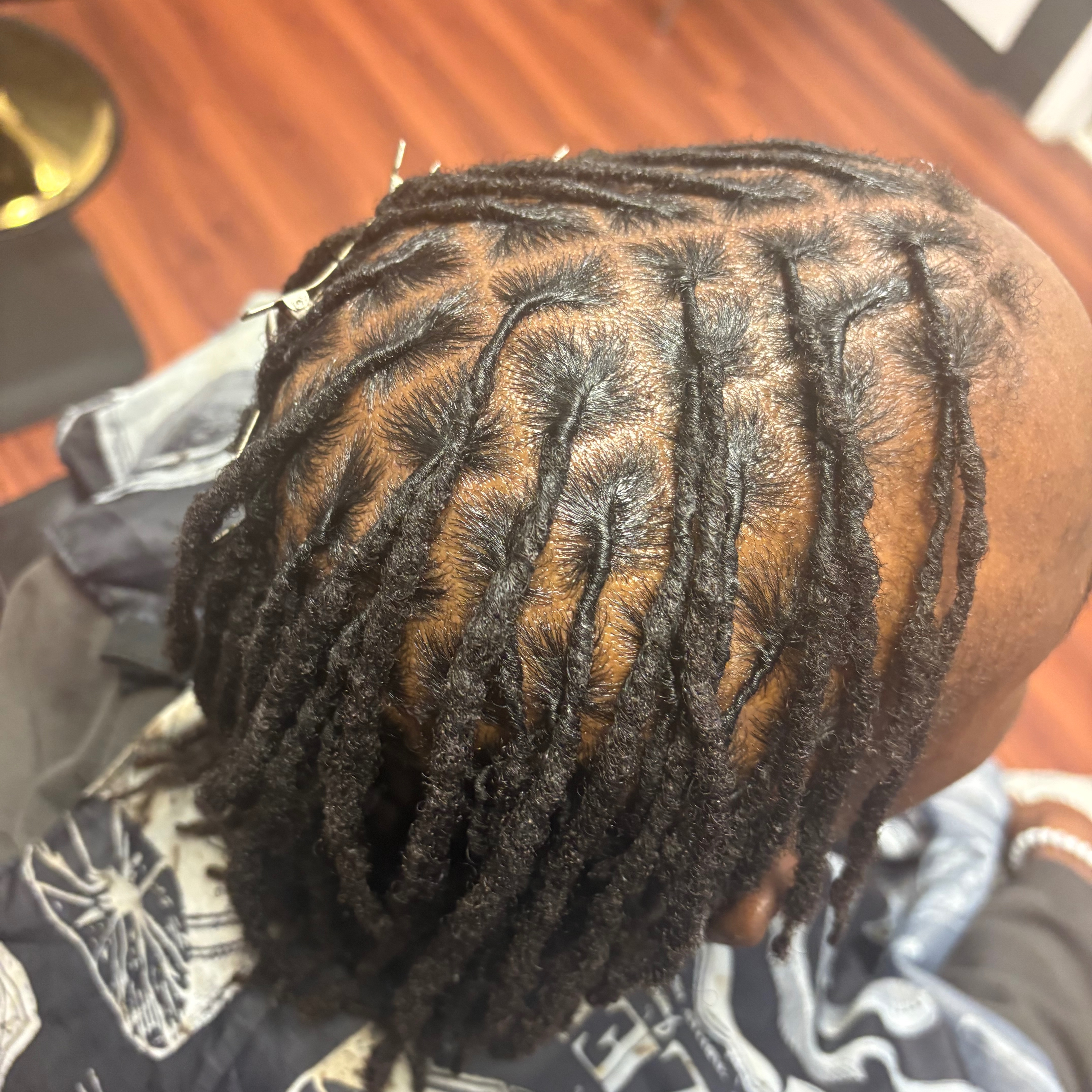 Loc Retwist at Taj The Stylist in Methuchen, NJ