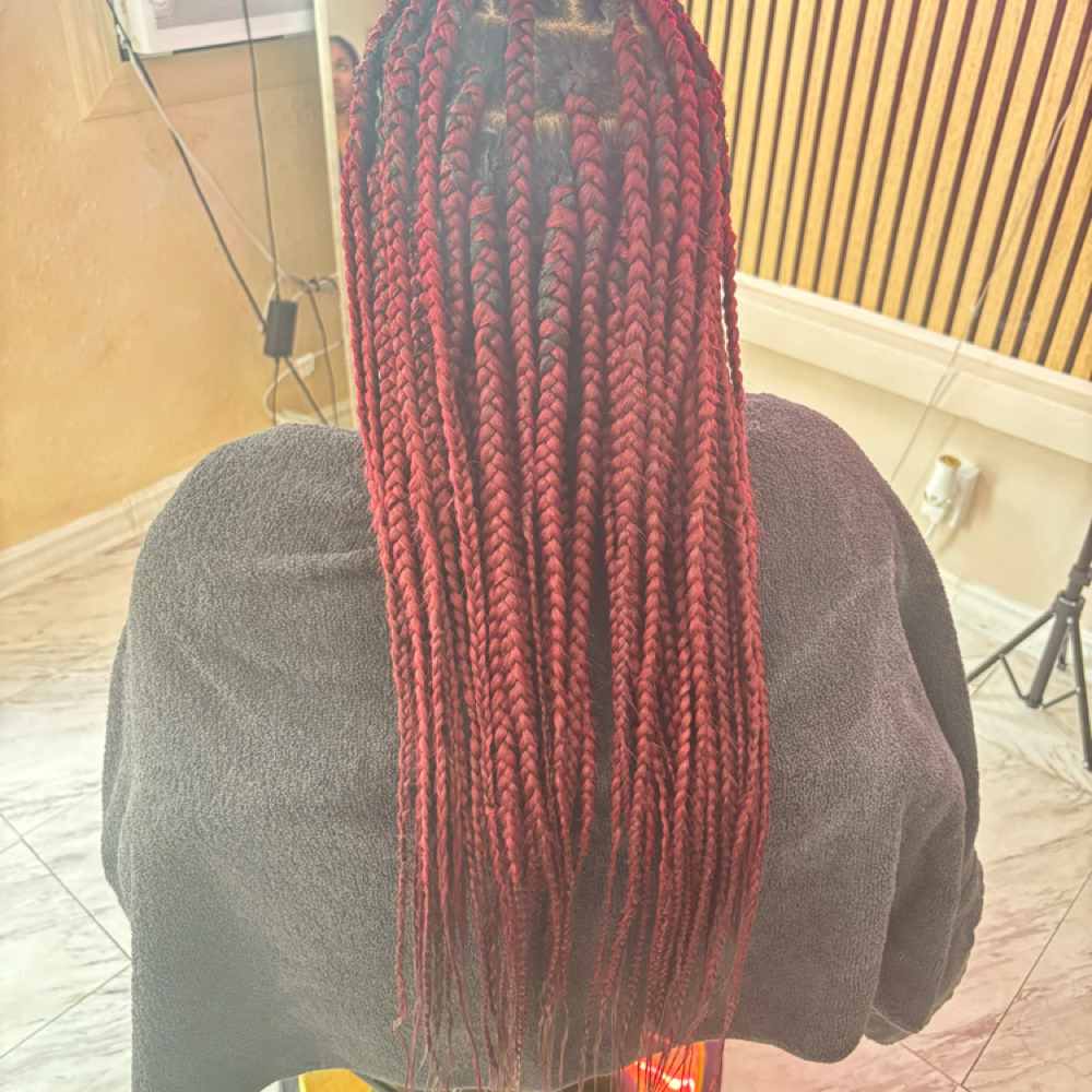 Medium Knotless Braids at Yanelis Braids in Port Richey, FL
