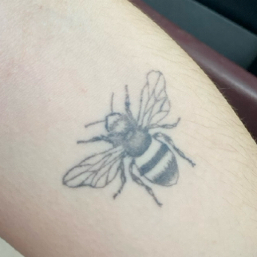 Tiny Fine Line Tattoo at Kalypso Lounge in Texarkana, TX