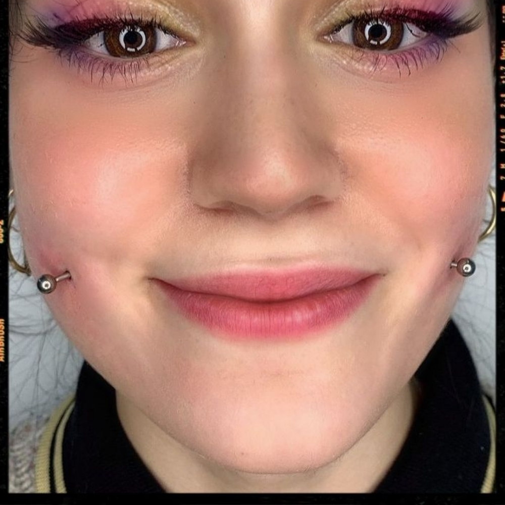 Cheek Piercing at Spellbound Piercing in Dillon, MT