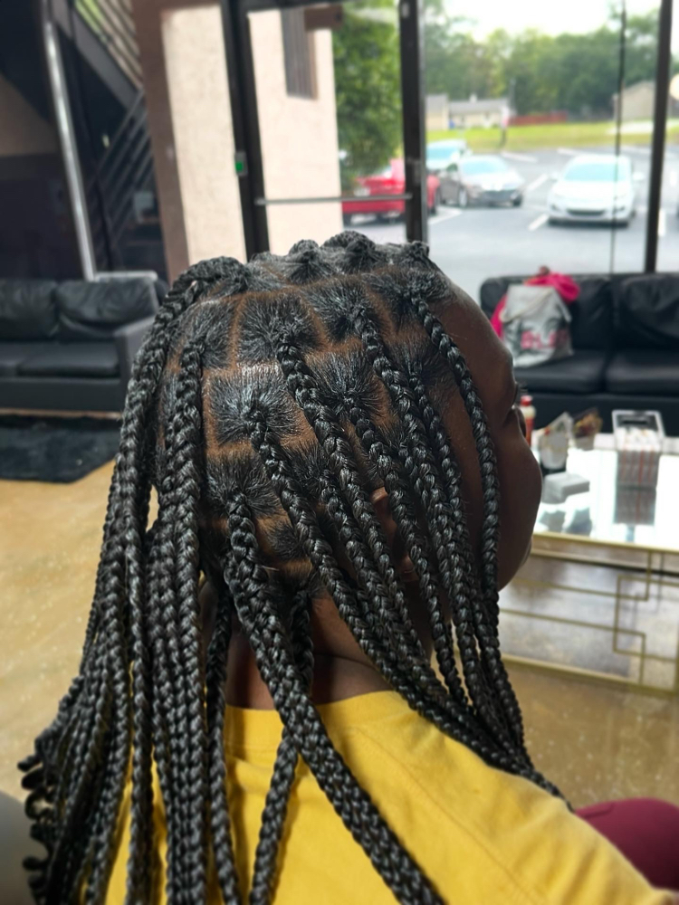 Knotless Braids at CurlyQ Braids & Locs in Columbus, GA