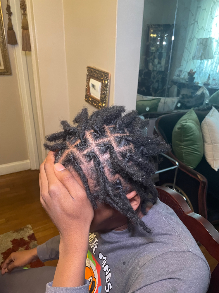 Retwist at MOODYSCREATIONS in Clinton, MD