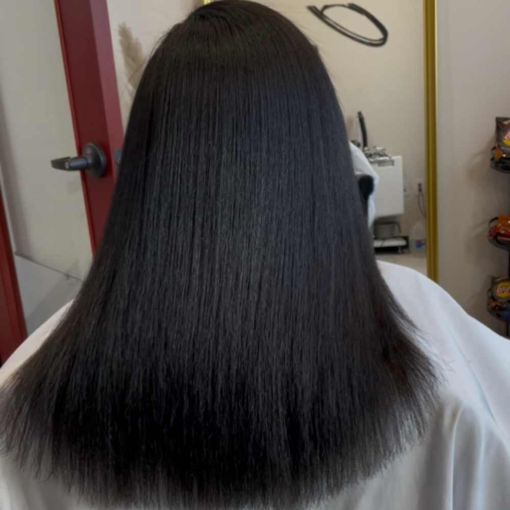 Flat Iron(Relaxed/Trained Hair) at The Joi N Beautie in Katy, TX