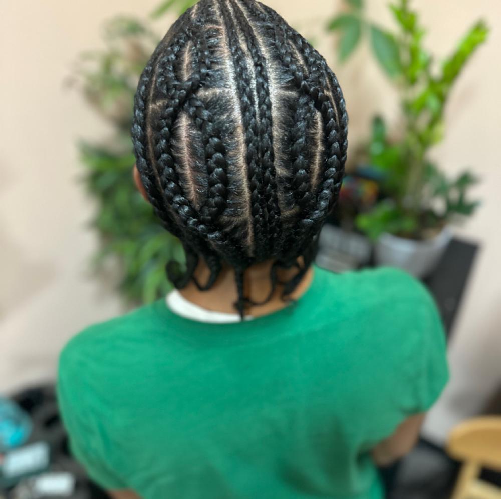 Men Cornrows With Design at WestAfrican Beauty Junction Braids in Prosper, TX