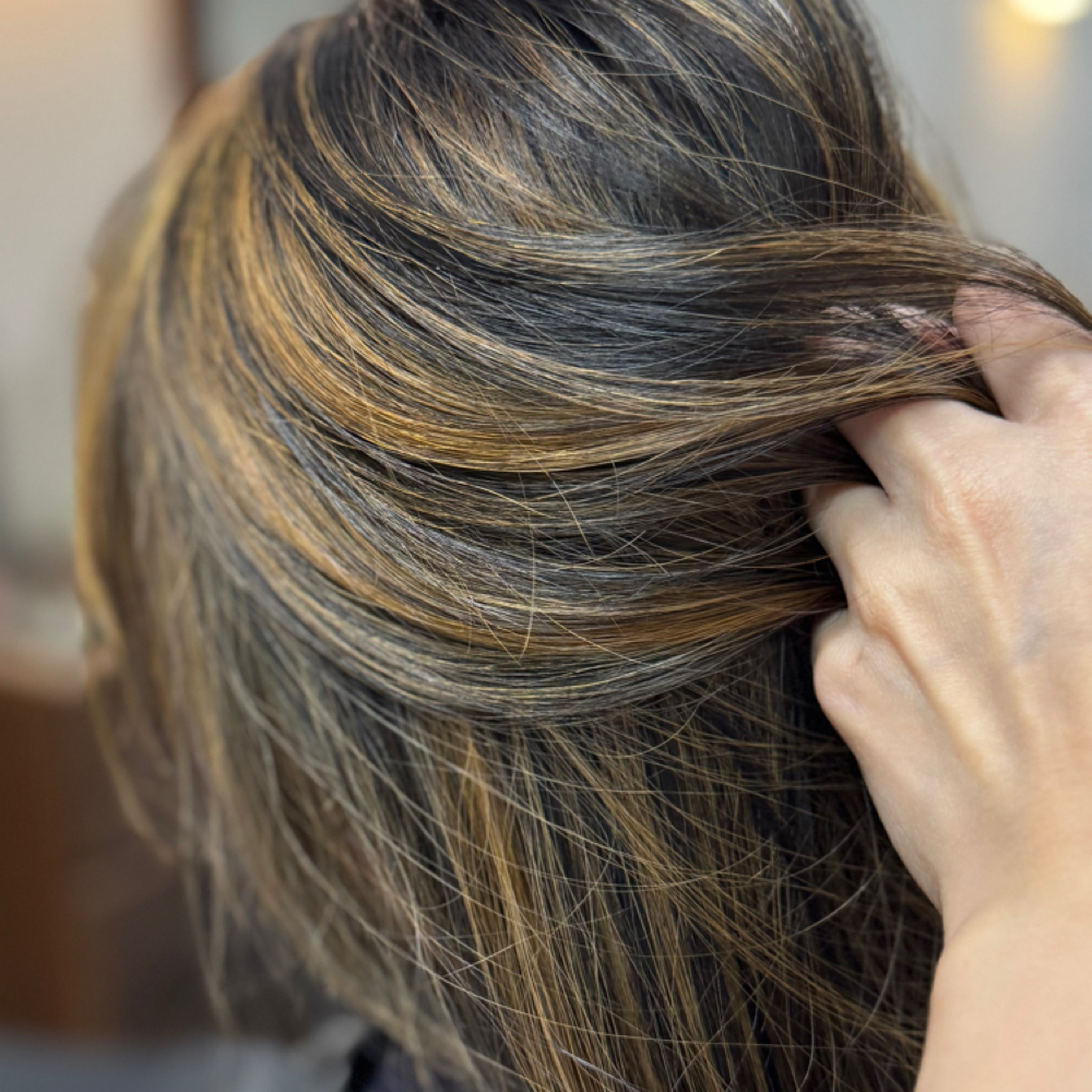 Full Highlight at Hair By Sydney Raine in Carson, CA