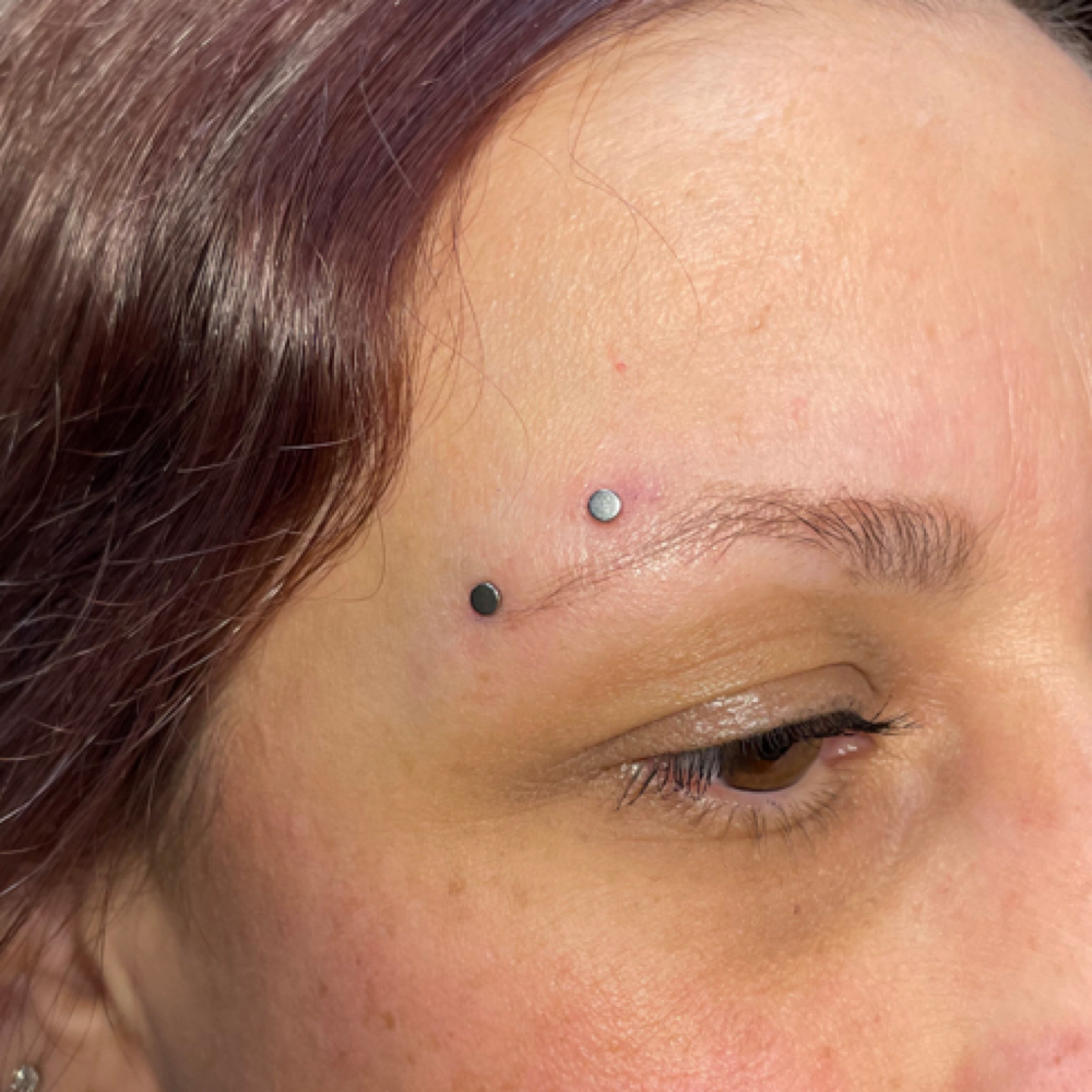 Horizontal Eyebrow (Surface Bar) at Piercedbyrayo in Clovis, CA
