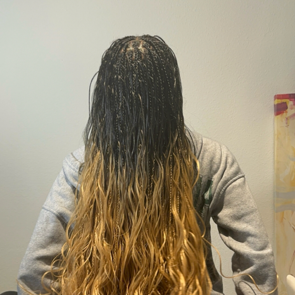 Customized Pattern Braids at TEL Hair Braiding & Beauty Supply in Garland, TX