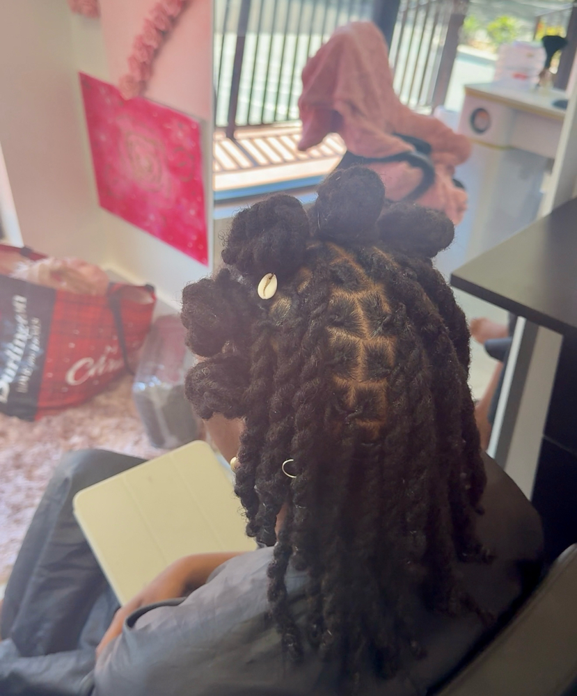 Loc Retwist(Includes up to 6 braids