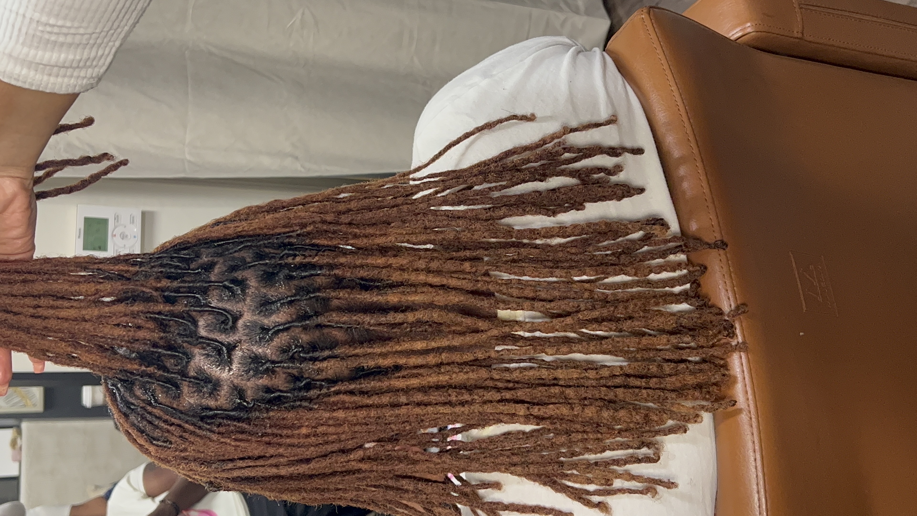 Loc Retwist (75-120) at TheAfterEffect in Houston, TX