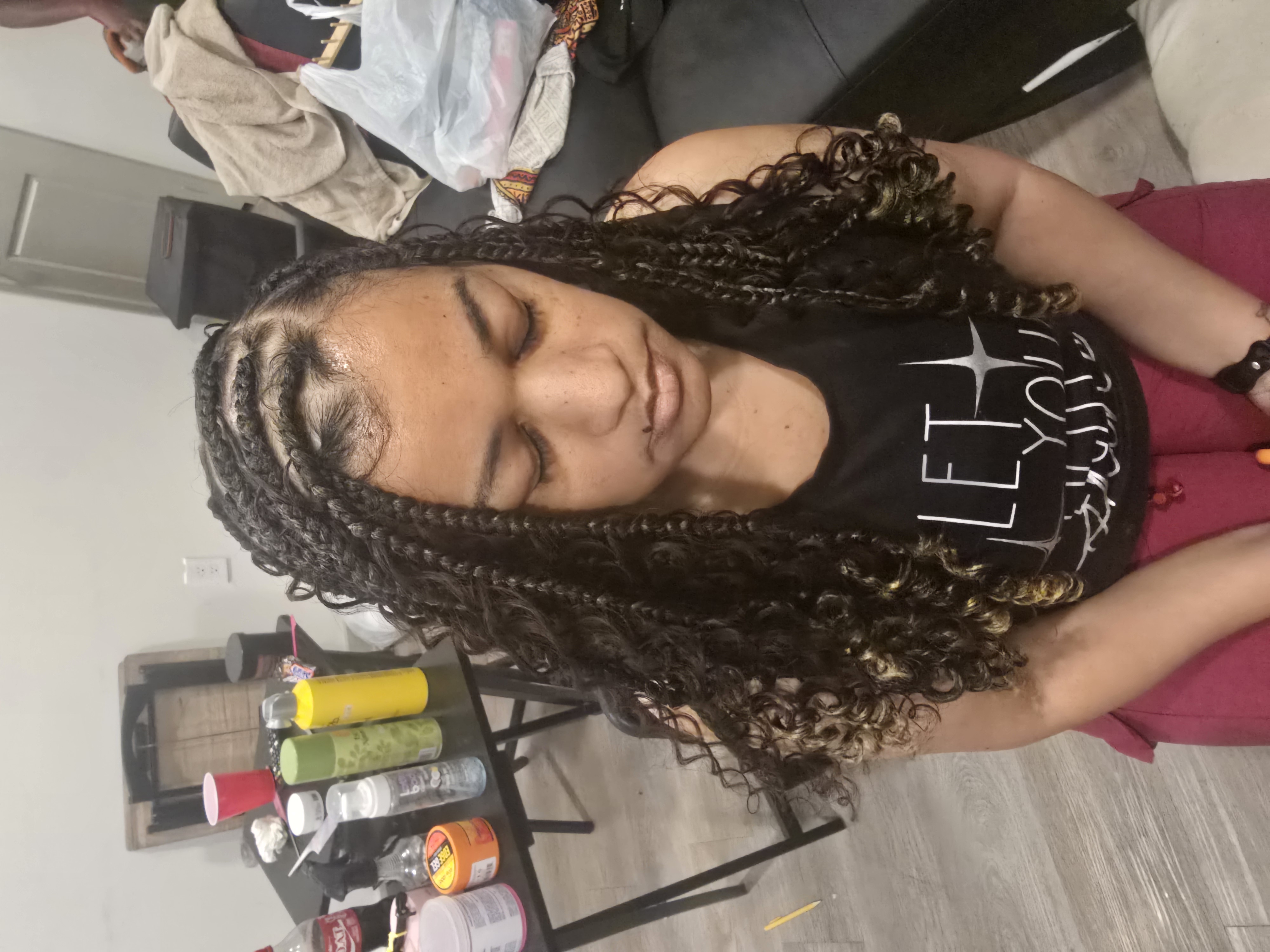 Knotless braids at BRAIDSBYLOVEJOY in Lewisville, TX
