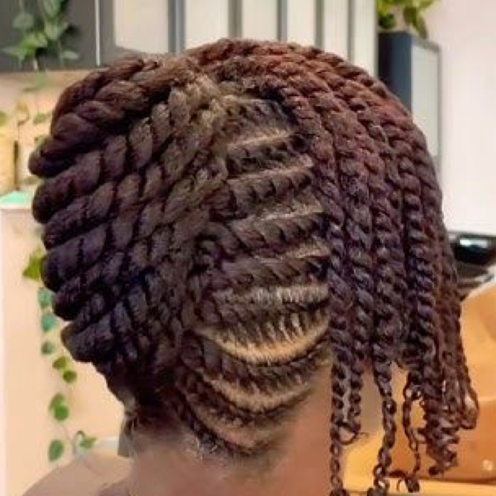 Sculpted Flat Twist or Natural Updo at Flair Beauty in Houston, TX