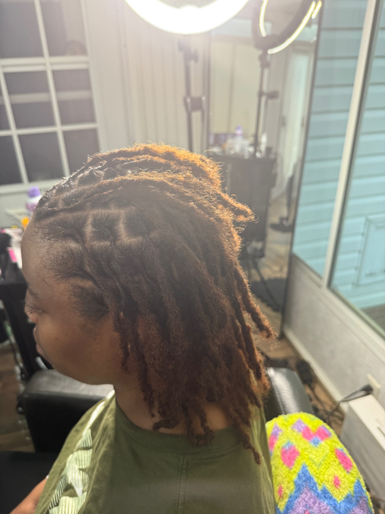 Loc Retwist (Shoulder to Mid Back) at Anointed Touch in Jetersville, VA