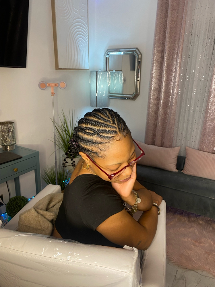 Stitched Braids with Two Buns at JRoyBraids in Mobile, AL