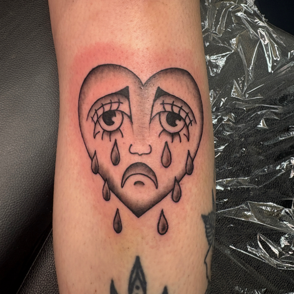“Medium” Tattoo at Golden Tattoo & Piercing in Iowa City, IA