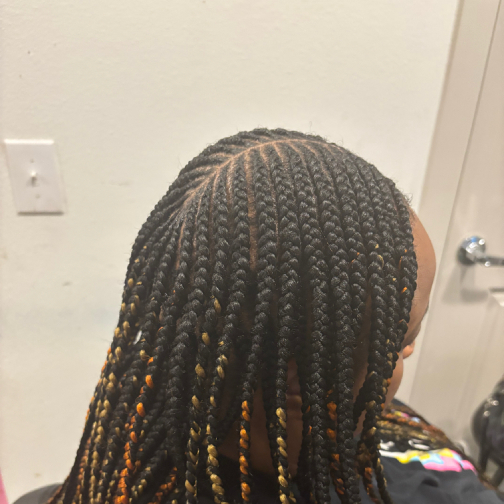 Cornrow braids at ClarSim hair braiding in austin, TX