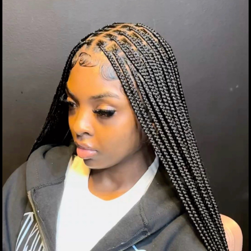 Knotless Braids (small ) at K Luxe Hair