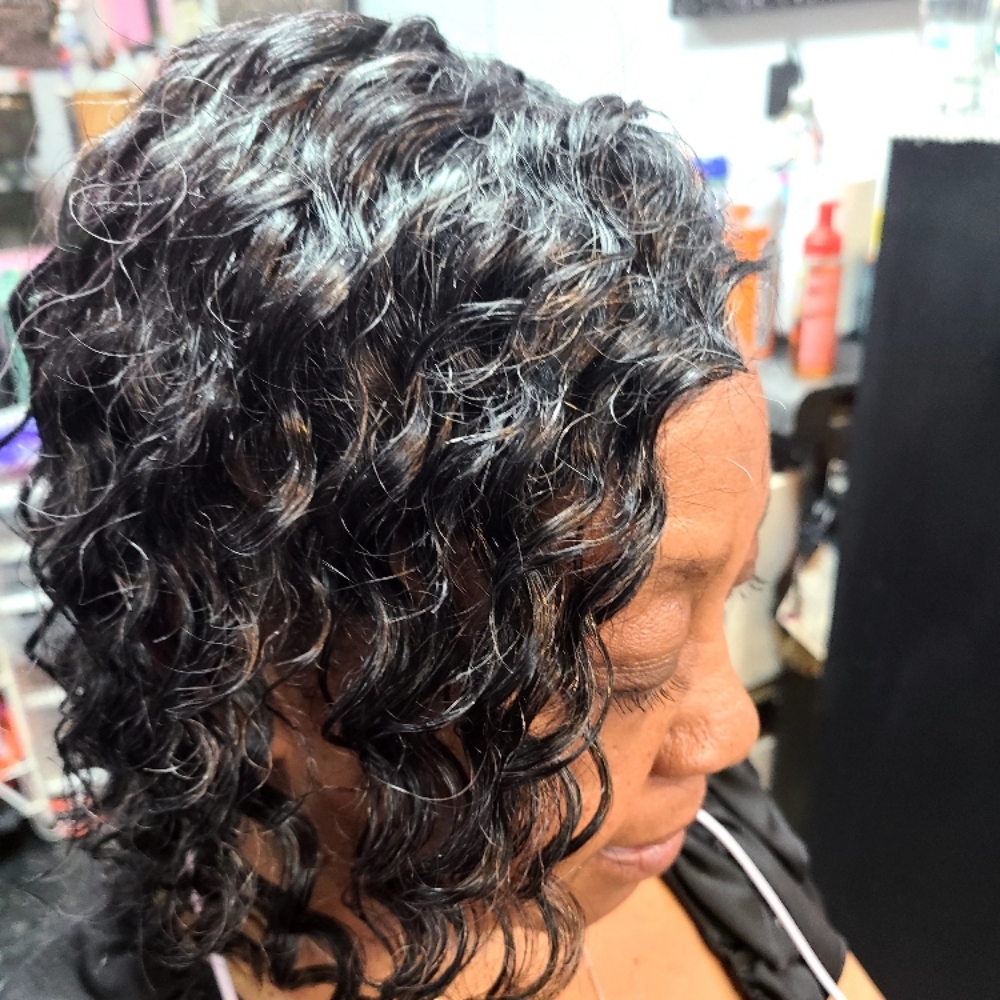 1/2  Center Top Weave at Chon's Unique House of Hair in Detroit, MI