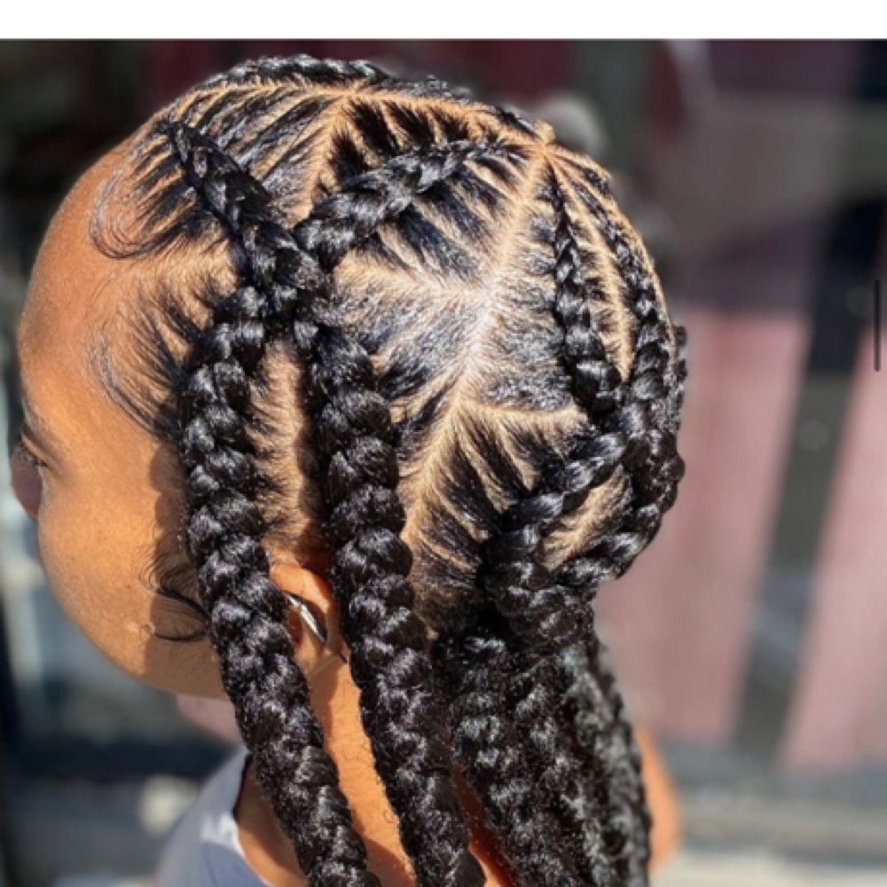 Criss-cross stitch braids at Luxury By Fatima in Atlanta, GA