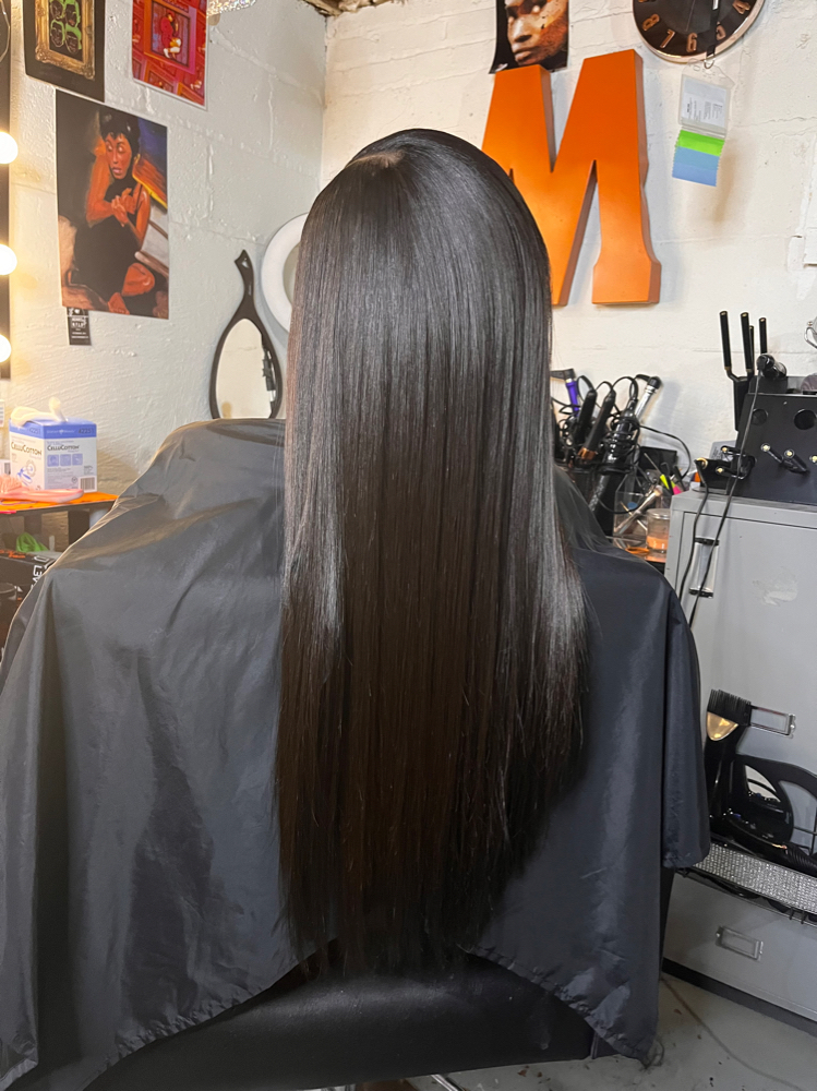 Straightening at Malayzian Stylez in Hammond, IN