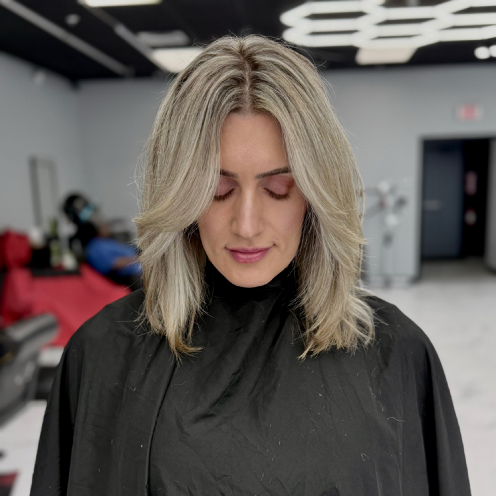 Full Head of Highlights at Reyes Styles Barbershop & Salon in Salisbury, MD