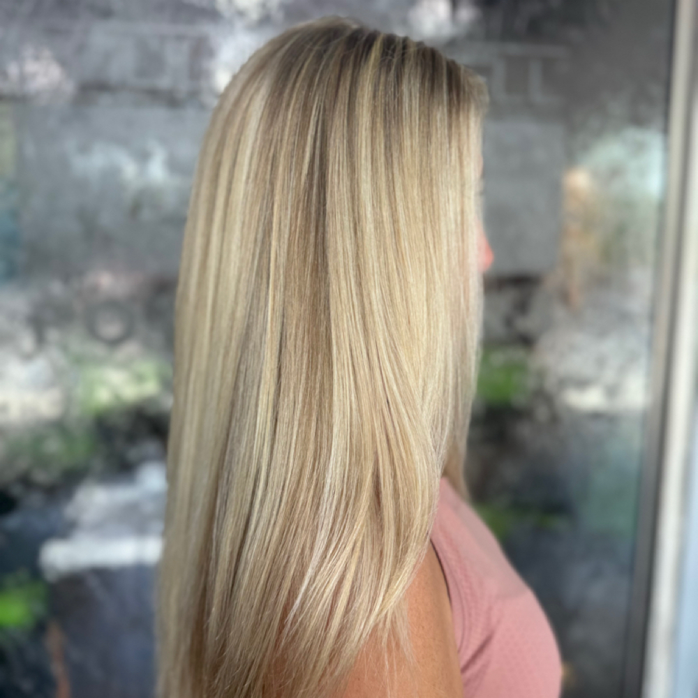 Platinum/full blonding root touchup at All About Me Beauty Bar in Labelle, FL