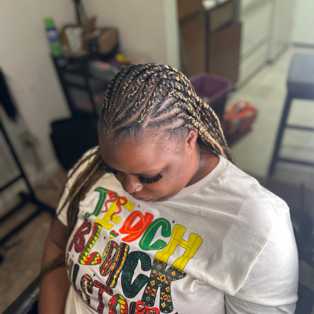 Medium Feed Ins W/knotless at Braids By Nerissa in Houston, TX