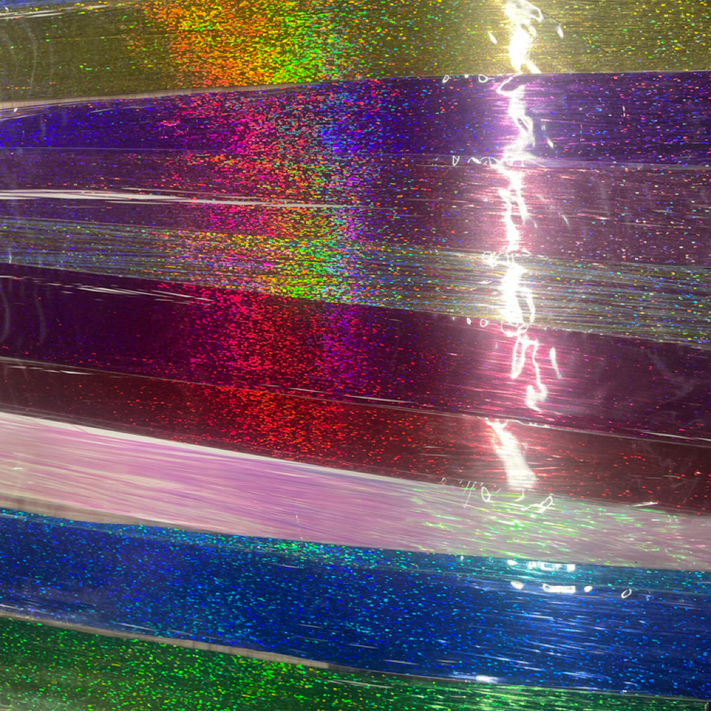 Feather/Glittter Extensions at Scissors Of Oz in Safford, AZ